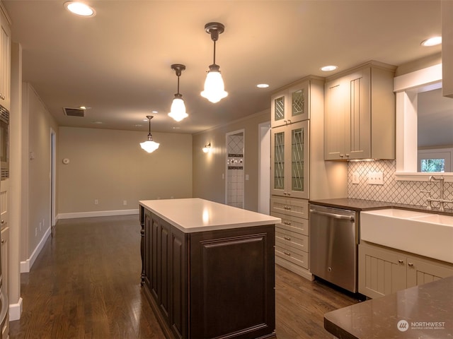 kitchen with backsplash, stainless steel dishwasher, decorative light fixtures, a center island, and dark hardwood / wood-style floors