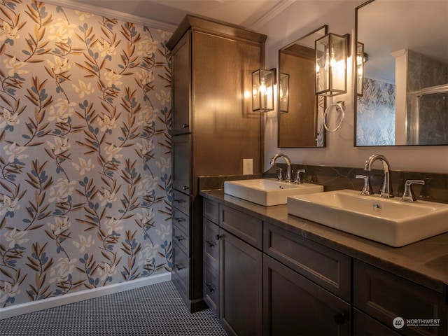 bathroom featuring tile patterned flooring, vanity, and ornamental molding