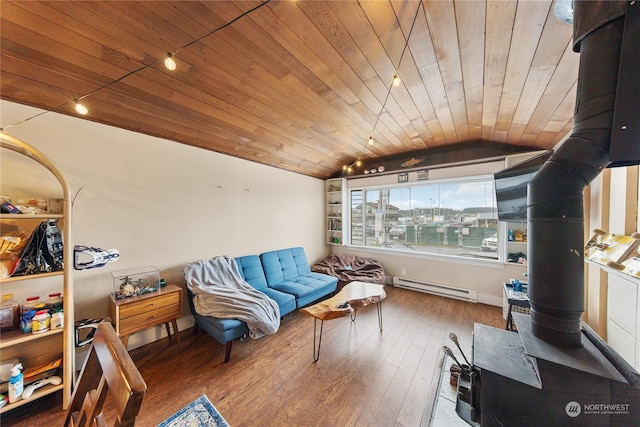 sitting room featuring baseboard heating, wooden ceiling, and lofted ceiling