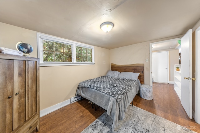 bedroom featuring dark hardwood / wood-style floors