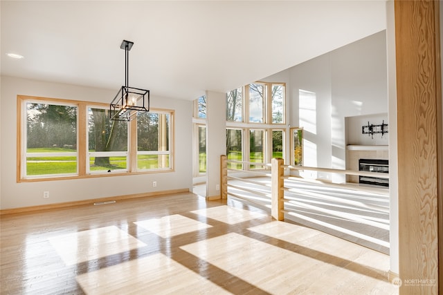 interior space featuring a fireplace and light hardwood / wood-style floors