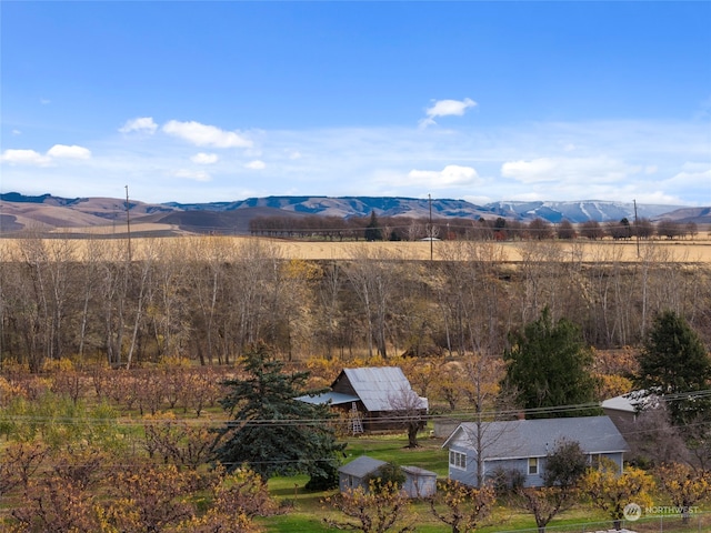 property view of mountains featuring a rural view