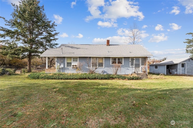 ranch-style house featuring a front lawn