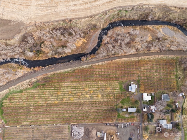 birds eye view of property featuring a rural view