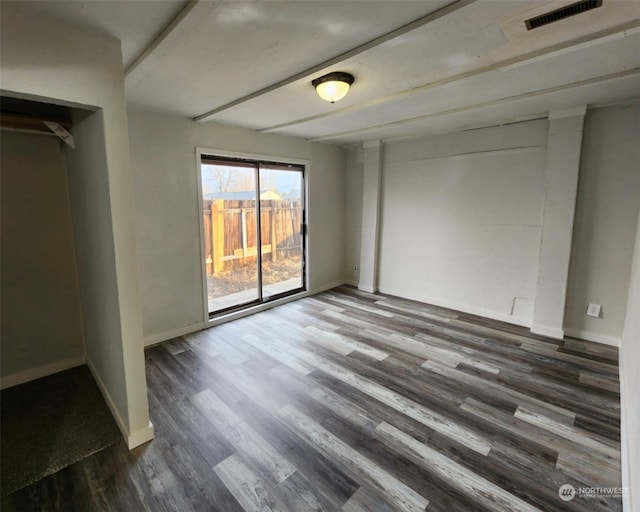 interior space featuring dark wood-type flooring