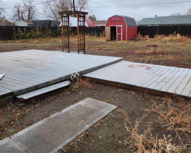 deck featuring a storage unit