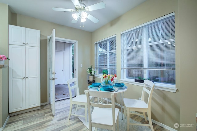 dining area featuring ceiling fan and light hardwood / wood-style floors