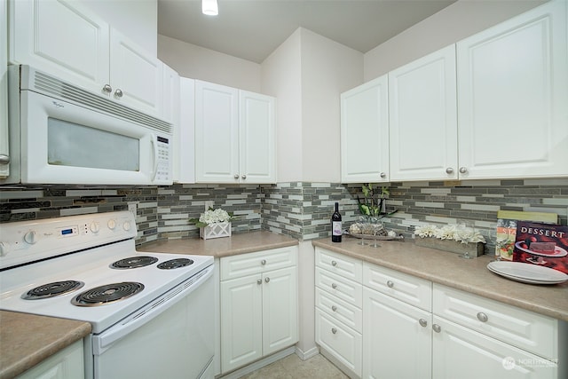 kitchen featuring white cabinets, decorative backsplash, white appliances, and light tile patterned floors