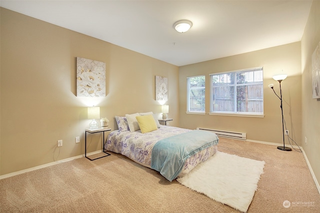 bedroom featuring carpet flooring and baseboard heating