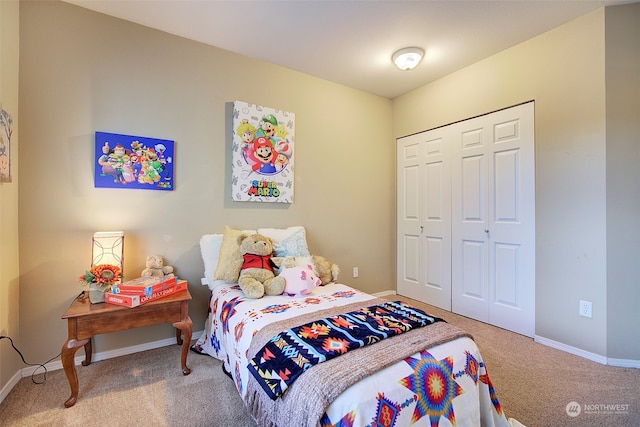 bedroom featuring carpet and a closet