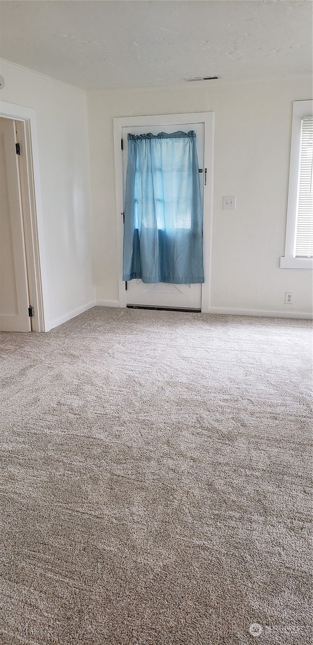 empty room featuring carpet