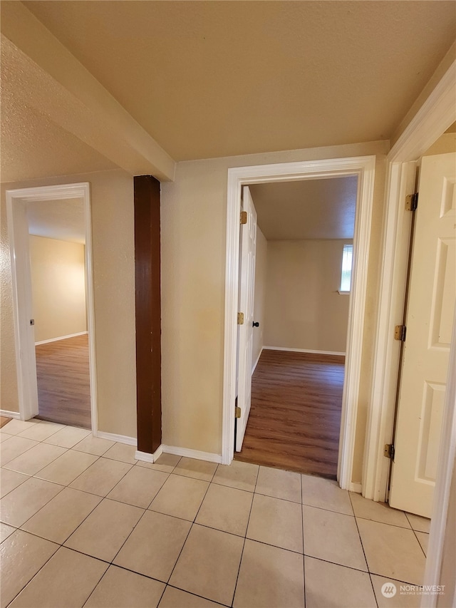 hall with light hardwood / wood-style floors