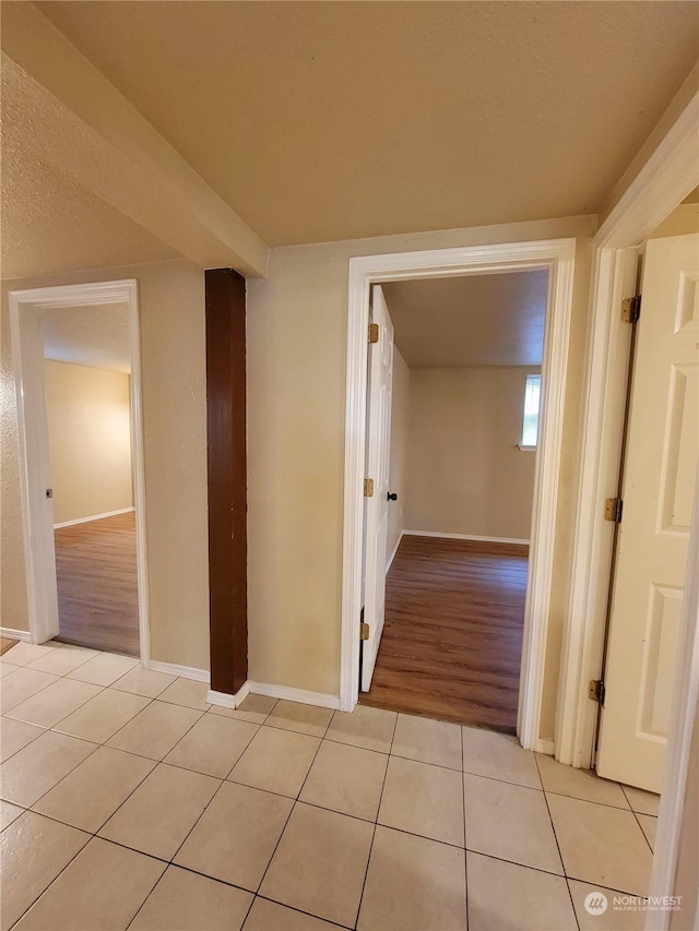 13808 C St S, Tacoma, WA 98444 - hallway with light tile patterned floors and baseboards