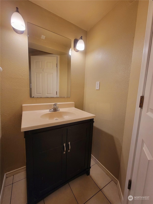 13808 C St S, Tacoma, WA 98444 - bathroom featuring tile patterned flooring, vanity, and baseboards