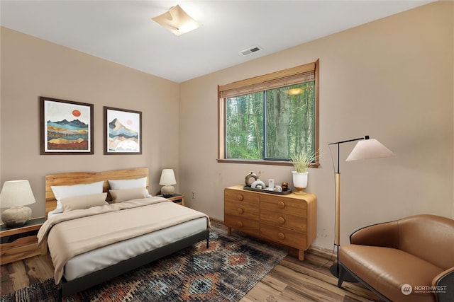 bedroom featuring hardwood / wood-style floors