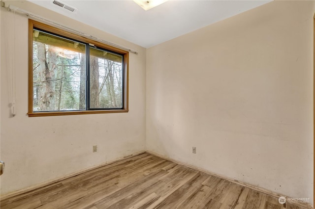 empty room featuring light hardwood / wood-style floors