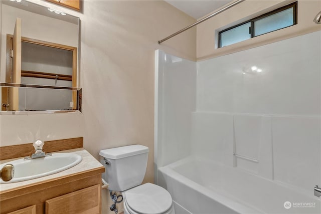 full bathroom featuring vanity, toilet, and shower / bath combination