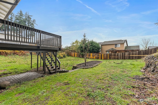 view of yard featuring a deck