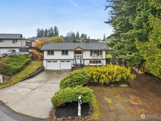 raised ranch featuring a garage