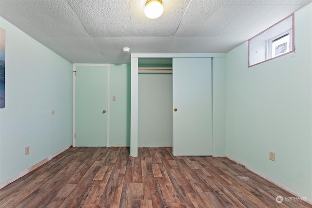 310 W 3rd Ave, Ritzville, WA 99169 - unfurnished bedroom featuring wood finished floors and a closet