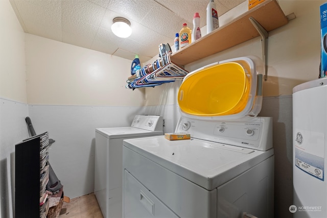 laundry area featuring independent washer and dryer and water heater