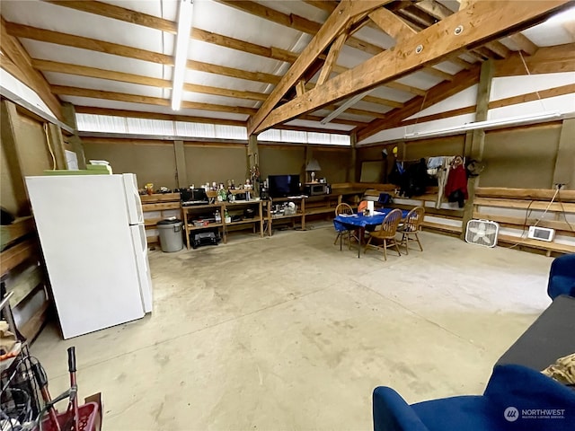 2820 State Route 105, Grayland, WA 98547 - miscellaneous room with lofted ceiling and unfinished concrete flooring