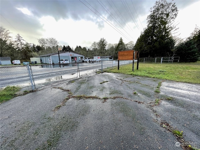 view of road featuring aphalt driveway