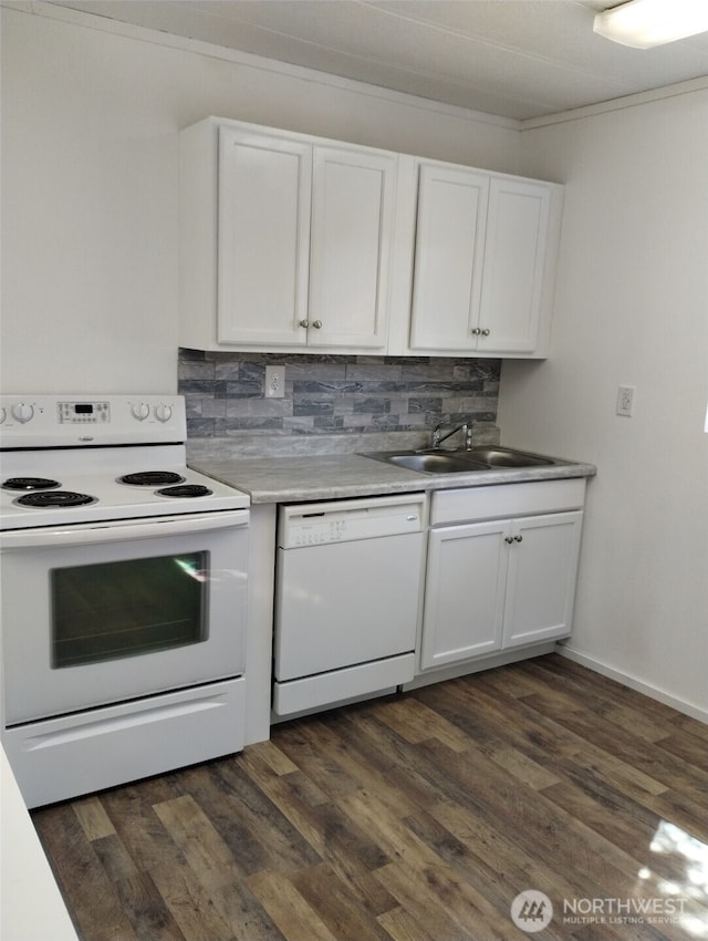 2820 State Route 105, Grayland, WA 98547 - kitchen with white appliances, white cabinets, backsplash, dark wood finished floors, and ornamental molding