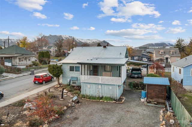 back of house featuring a mountain view