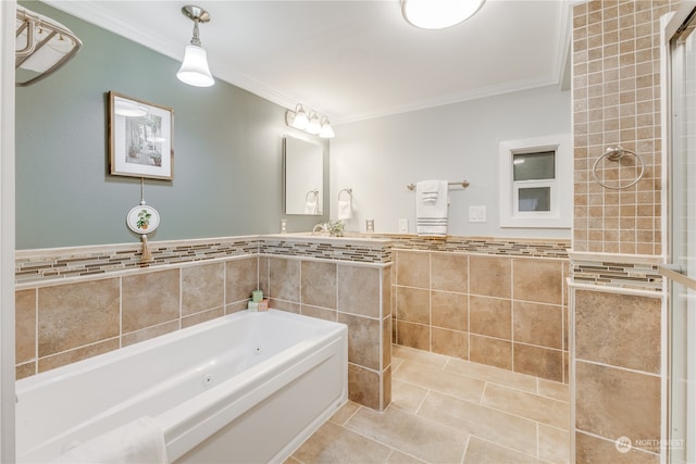 bathroom featuring tile patterned flooring, a bathtub, ornamental molding, and tile walls