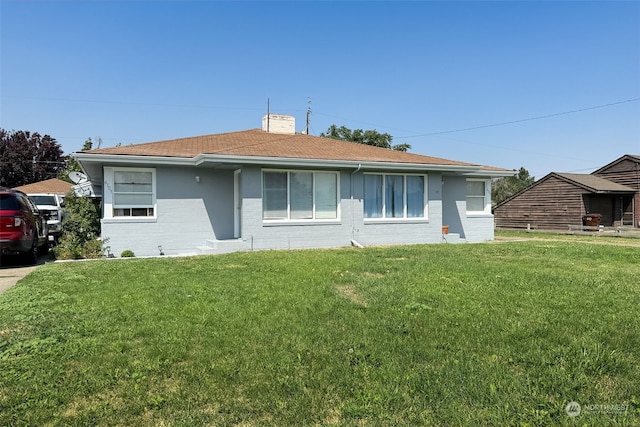 exterior space with a lawn