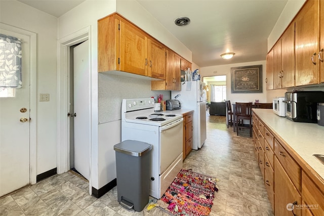 kitchen featuring white appliances