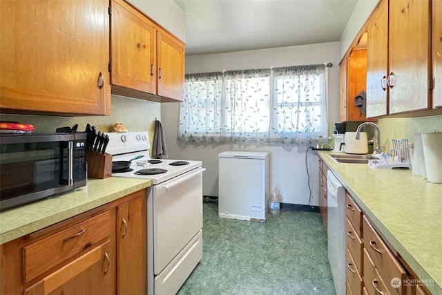 kitchen with white appliances and sink