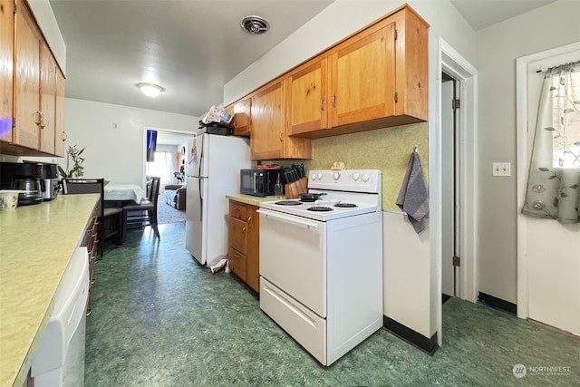 kitchen with white appliances