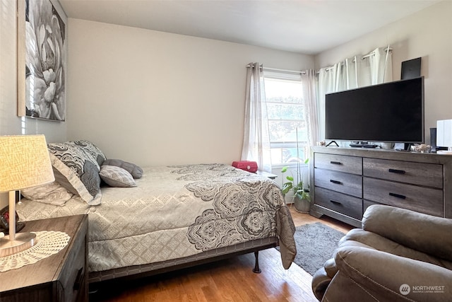 bedroom featuring hardwood / wood-style flooring