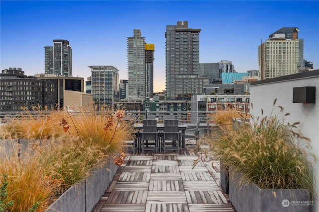 view of patio terrace at dusk