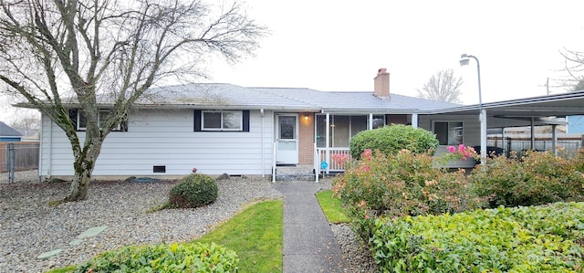 single story home with a carport