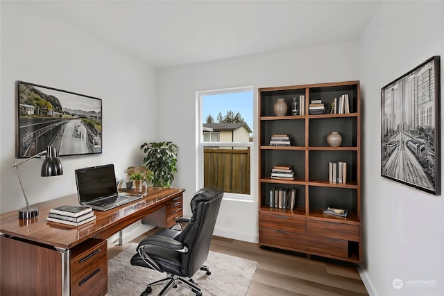 office space featuring light hardwood / wood-style floors