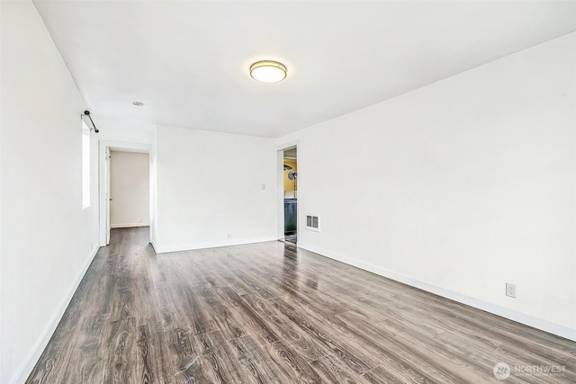 38 Viewdale St, Wenatchee, WA 98801 - spare room featuring dark wood-style floors and baseboards