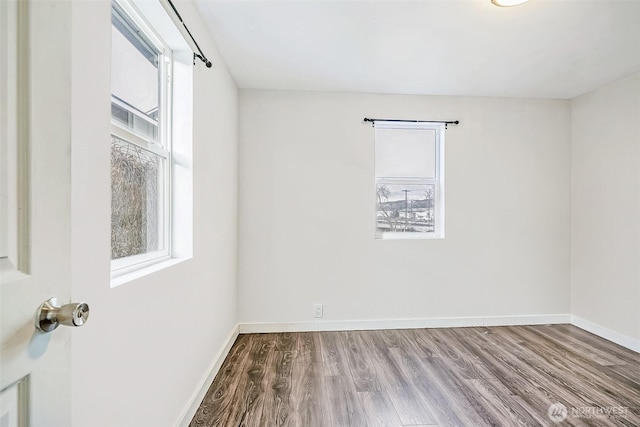 38 Viewdale St, Wenatchee, WA 98801 - empty room featuring healthy amount of natural light and wood finished floors