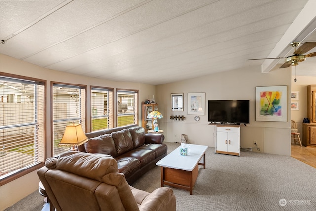 living room featuring light carpet, a textured ceiling, vaulted ceiling with beams, and ceiling fan