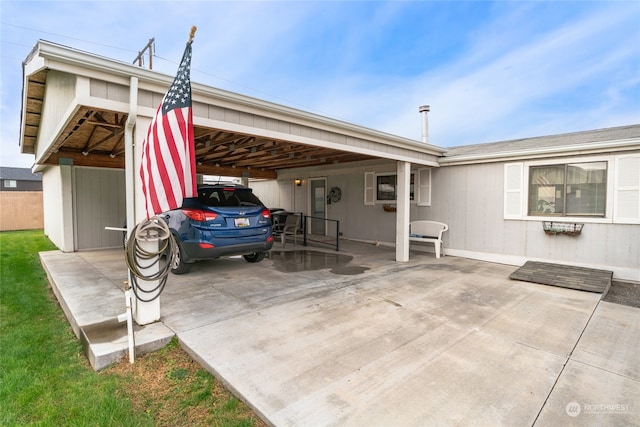 view of car parking with a carport