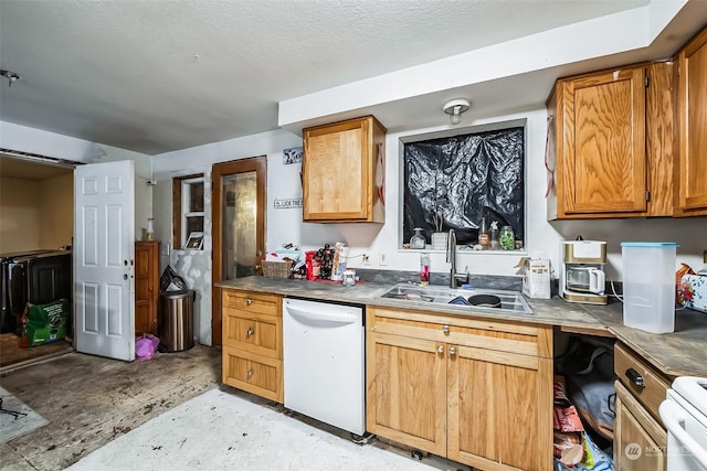 kitchen with dishwasher, range, a textured ceiling, and sink