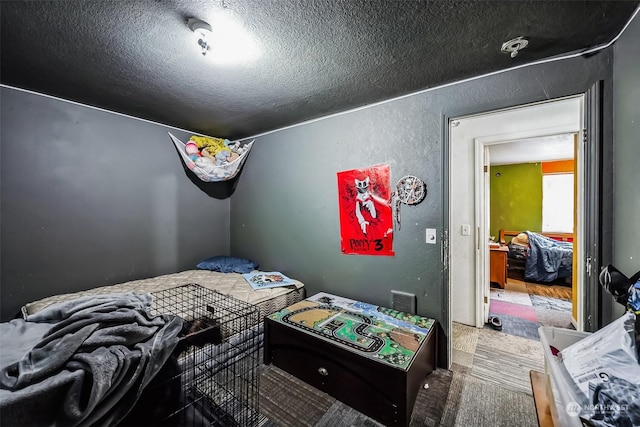 bedroom with a textured ceiling