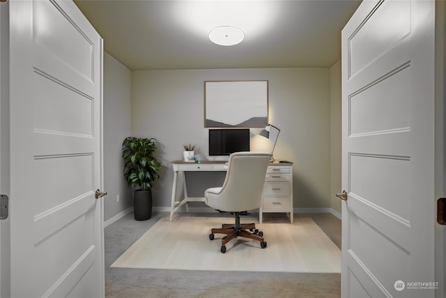 home office with light carpet