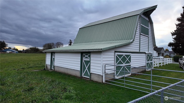 view of outdoor structure with a yard