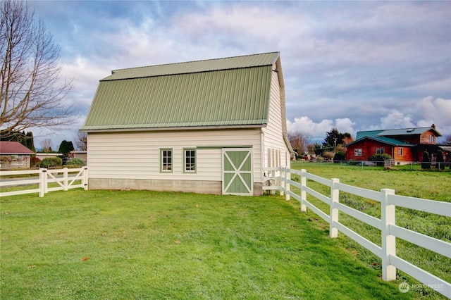 view of outdoor structure featuring a yard