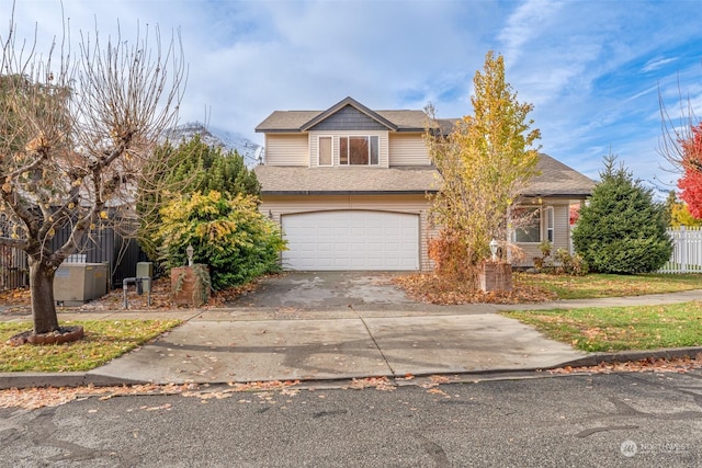 340 Brandi Ln, Wenatchee, WA 98801 - view of front of home featuring concrete driveway, an attached garage, and roof with shingles