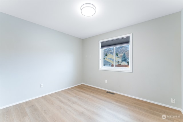 empty room featuring light hardwood / wood-style flooring