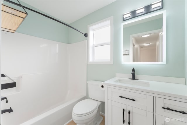 full bathroom featuring vanity, toilet, and shower / bath combination